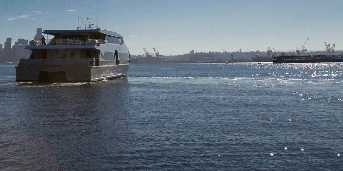 GIF of water taxi photo overlaid with image of ridership 2013, 2014 and 2015, and 515,000 record broken in October 2016.