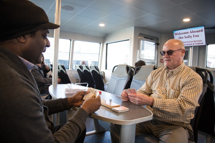 Mike Sudduth, donated the specially inscribed boards as a way to honor his friend, Sally Fox, says seasoned cribbage players can get in multiple games during the 22-minute run to and from Vashon Island.