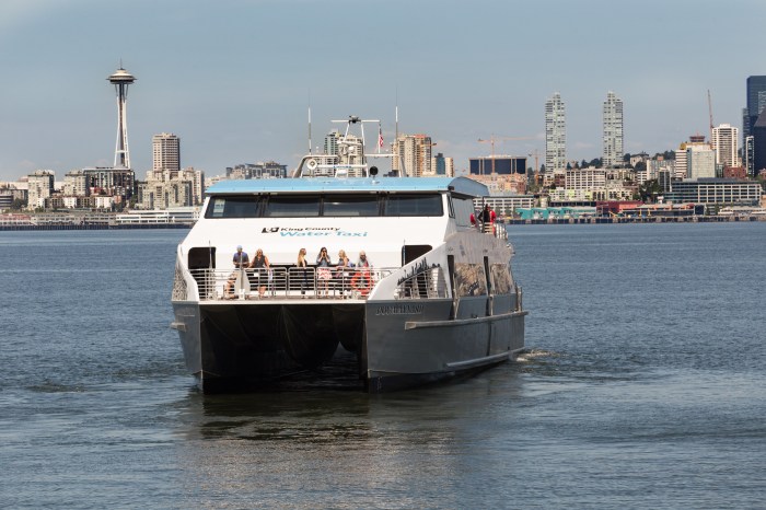 With the iconic Space Needle in the background, the Doc Maynard glides the waters of Puget Sound between Downtown and West Seattle.