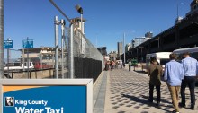 A King County Water Taxi sign greets passers-by of the service's temporary facility at Pier 52