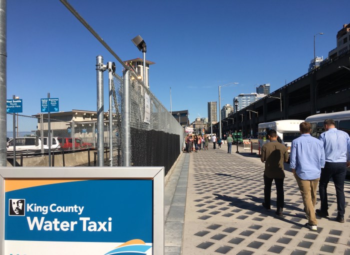 A King County Water Taxi sign greets passers-by of the service's temporary facility at Pier 52