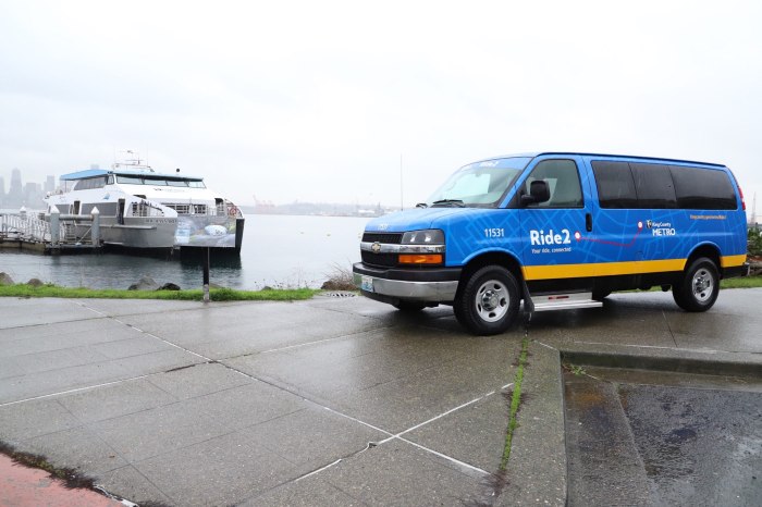 A Ride2 shuttle van overlooks the MV Doc Maynard as it's docked at Seacrest Park in West Seattle.