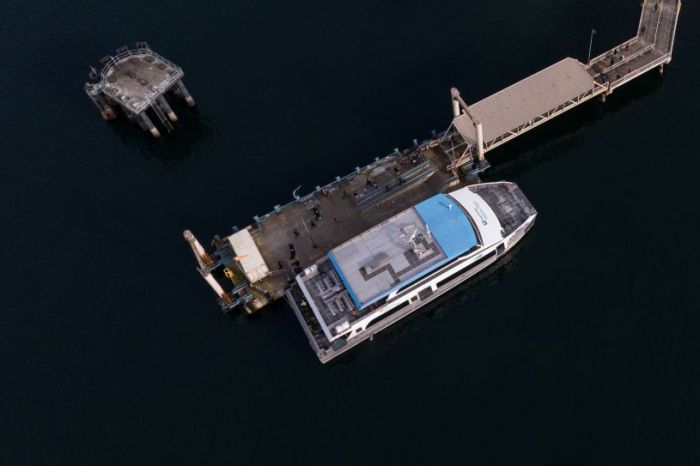 Overhead shot of the Vashon Water Taxi Terminal with people leaving the vessel