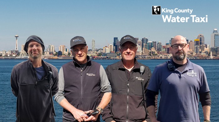 Water Taxi team that rescued person in water, l-r Deckhands Zach Klaja, Nick White and Mike Smythe, Capt. GW Rogers