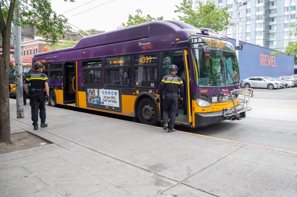 Metro Transit Police checking with a operator on route