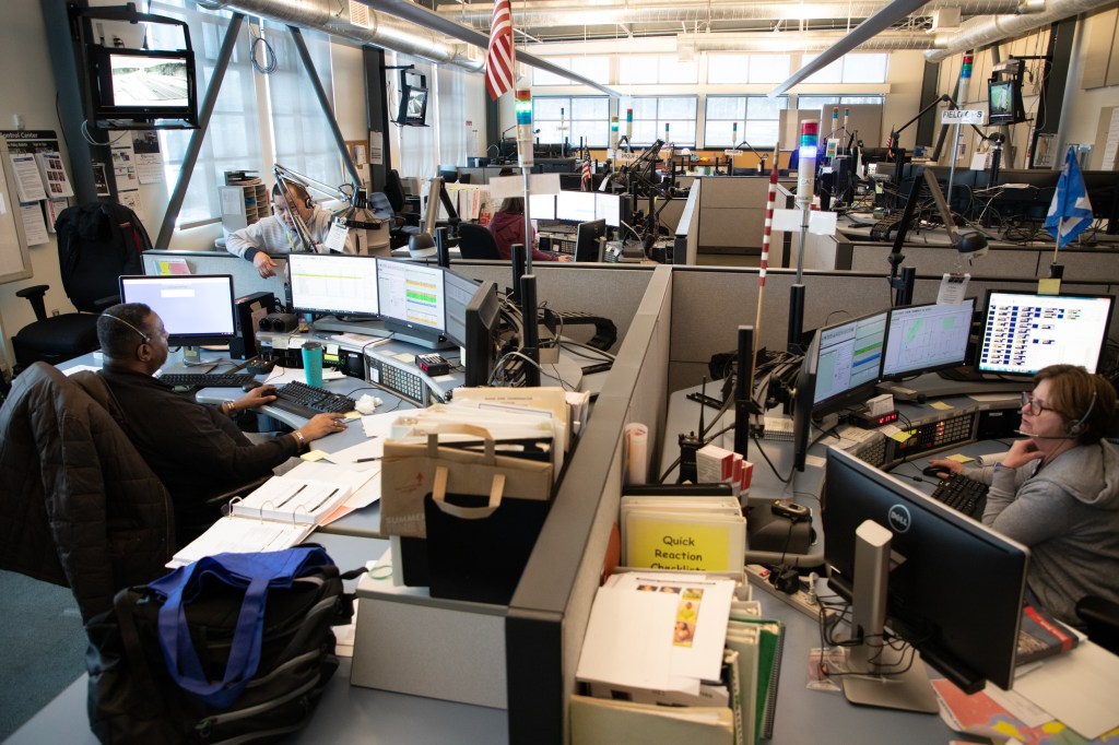 Members of the Transit Control Center team working on keeping buses moving